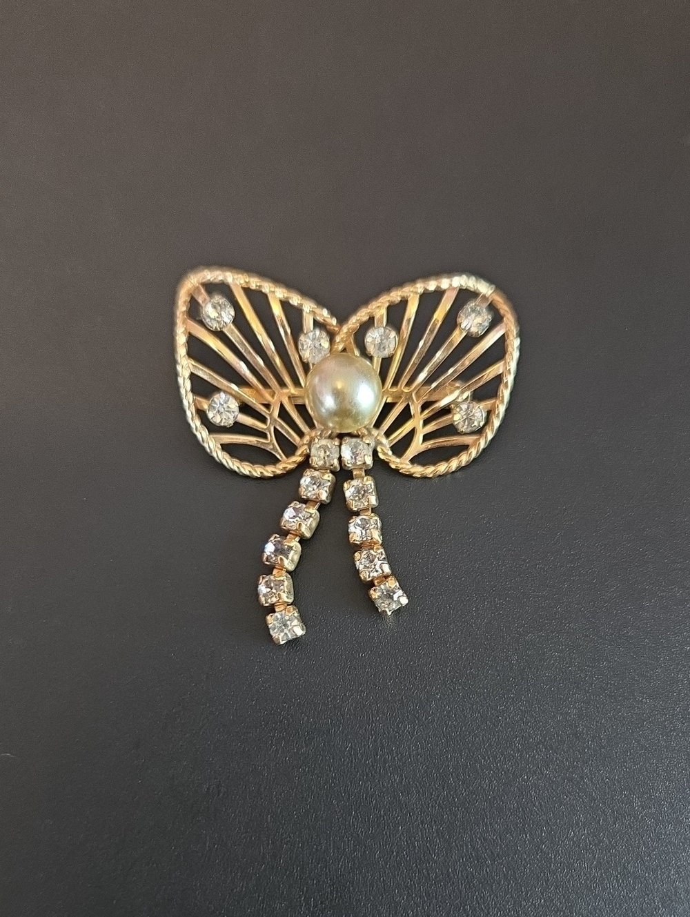 Gold Tone and Diamond Bow Brooch